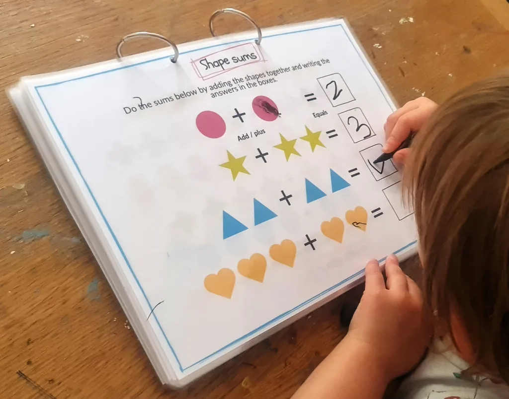 Adding and taking away - maths activity book