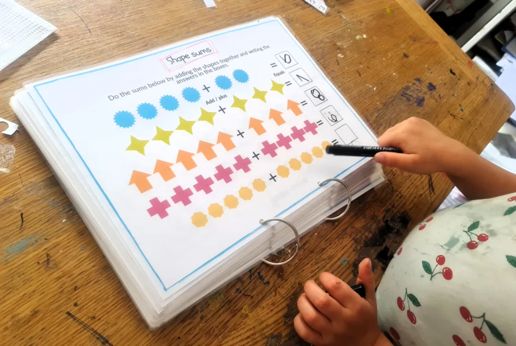 Adding and taking away - maths activity book