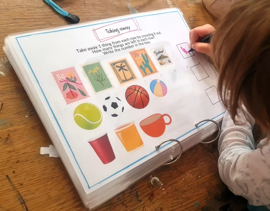 Adding and taking away - maths activity book